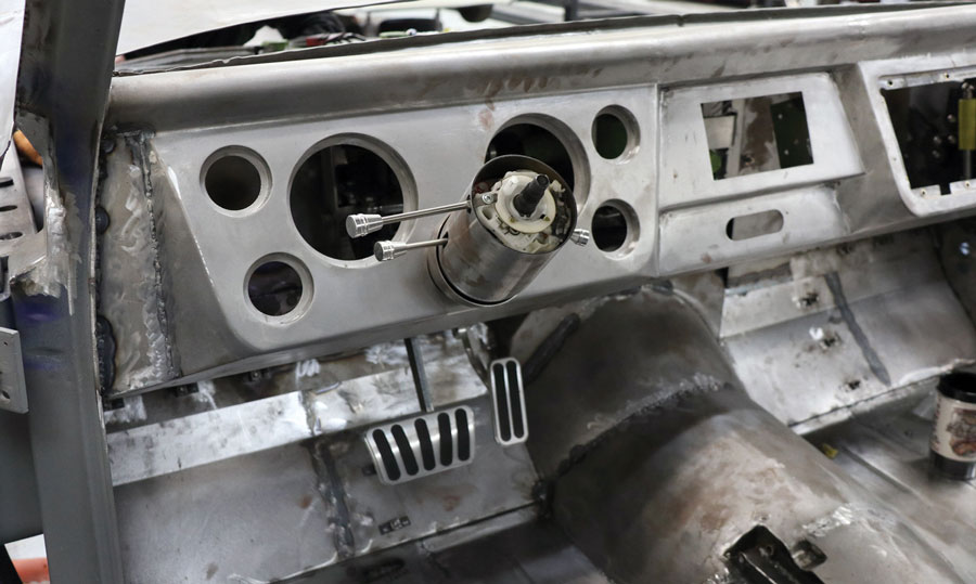 The dash, while having a C10 look, is truly custom fabricated to hold the Classic Instruments AutoCross gauges as well as cradle the ididit tilt-steering column.