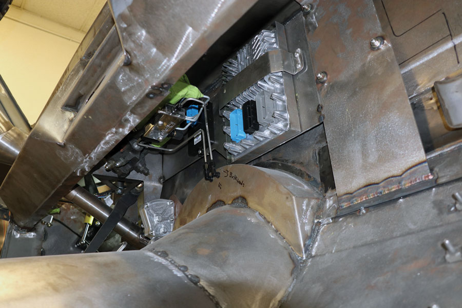 A peek under the dash shows where the VA components will live as well as all of the necessary engine/trans controllers.