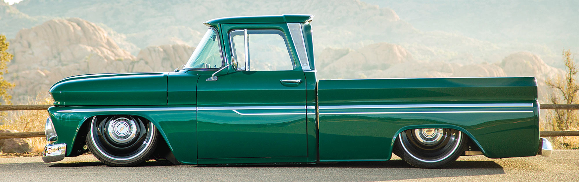 1963 Chevy C10 side profile with mountain backdrop