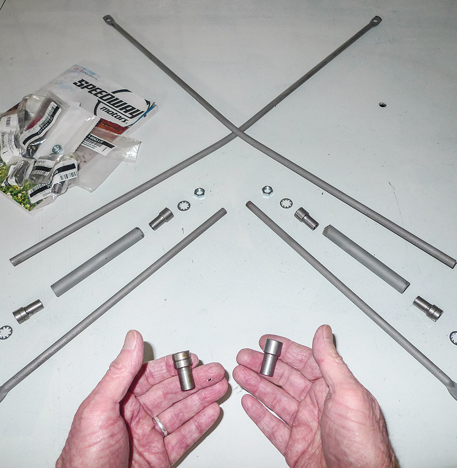 reinventing the X-brace by cutting a couple 5-inch lengths of thin steel tubing