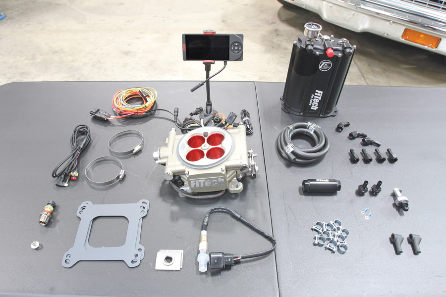FiTech Go Street EFI kit with a Force Fuel system laid out on a table