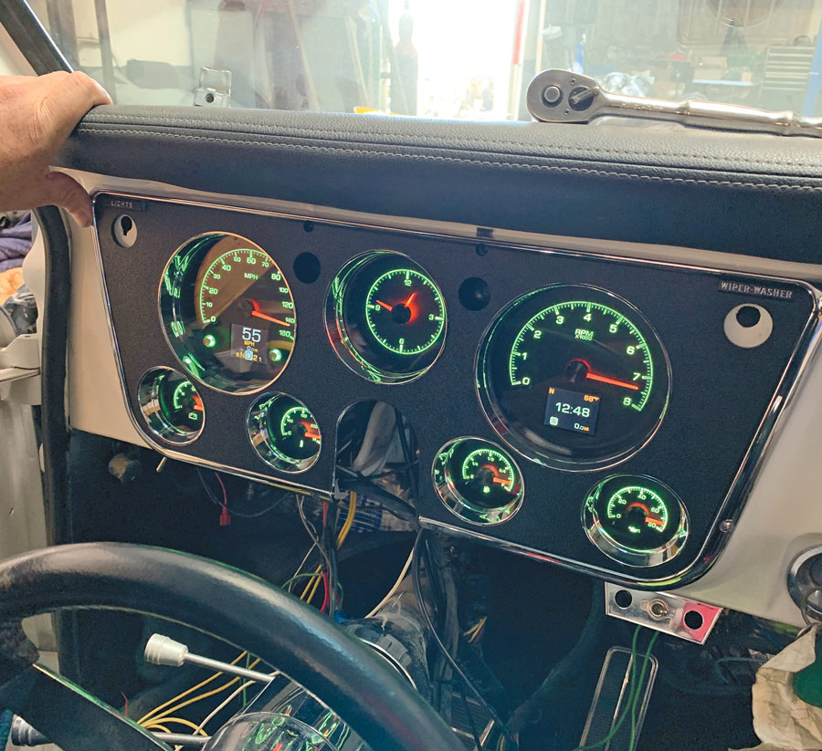 Fully illuminated gauge cluster in green