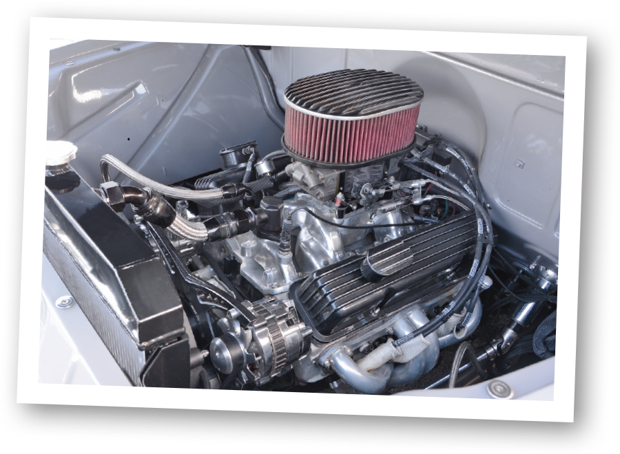 polaroid of 1957 Chevy 3100 engine