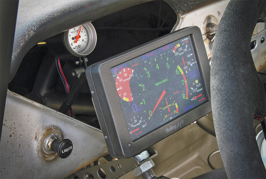 view of 1956 Chevy 3100 monitor behind steering wheel