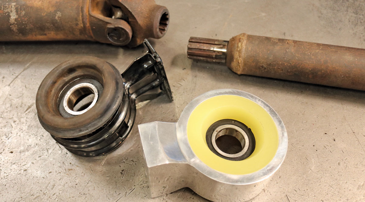 8: For comparison sakes, here’s an original-style rubber carrier bearing next to the CPP billet polyurethane unit we’ll be installing