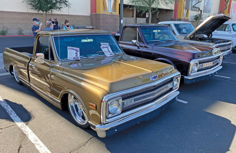 two trucks at a car show
