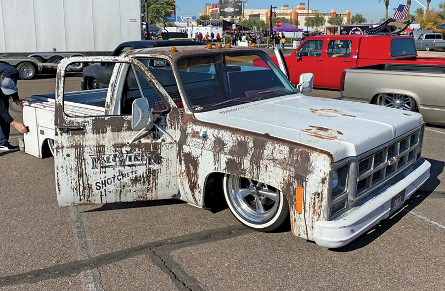 white truck with natural rusted paint job