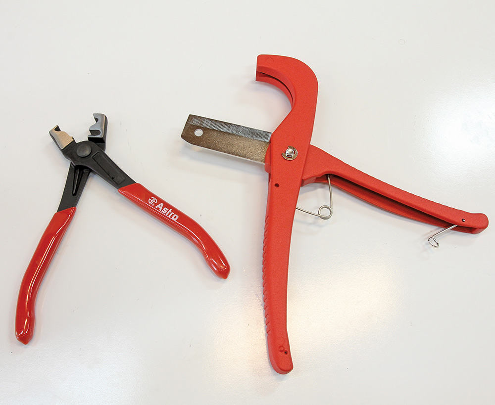 looking at the sharp hose cutter and purpose-built plier