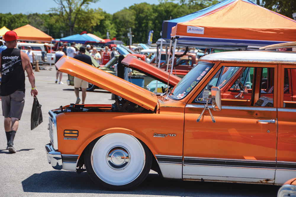 Orange Chevy truck with open hood