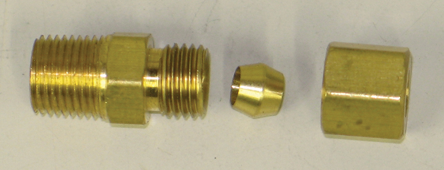 Compression fittings use a nut and a ferrule to seal the tubing close-up