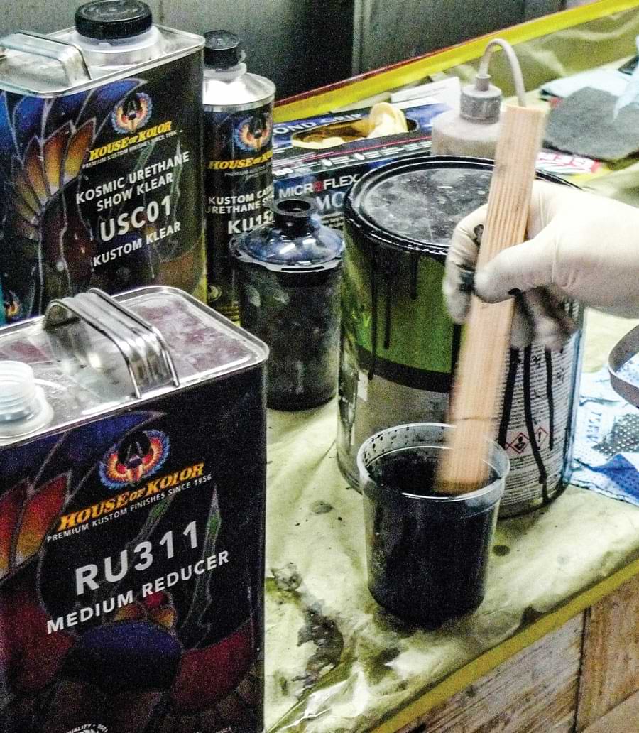 15: For this cool day Reveles chooses medium reducer and gives House of Kolor jet black basecoat a thorough stir just prior to straining