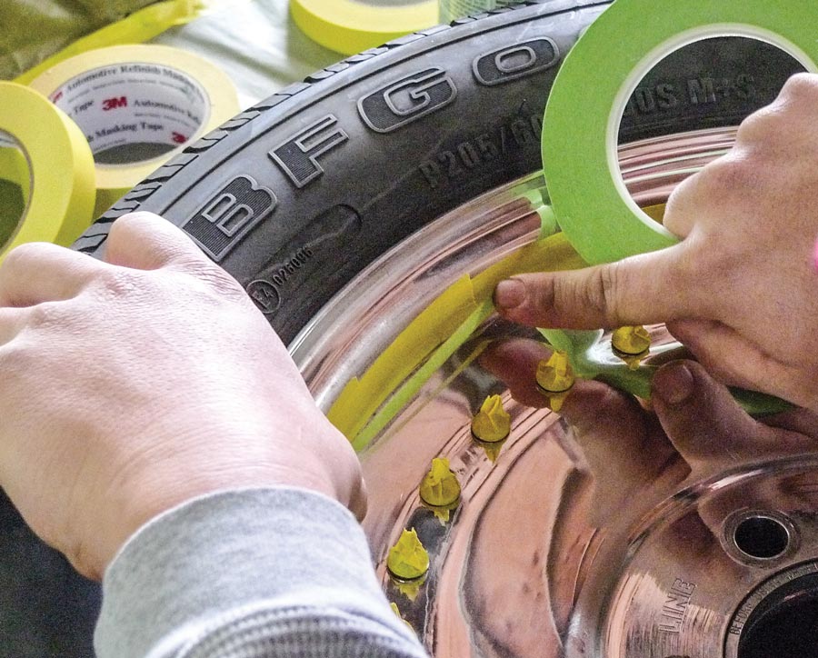 5: Since we’re only painting the wheels’ centers, the polished rim sections are protected with top-quality masking tape