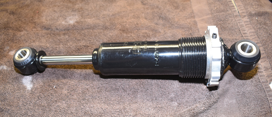 non-adjustable coilover shocks with black powdercoated body