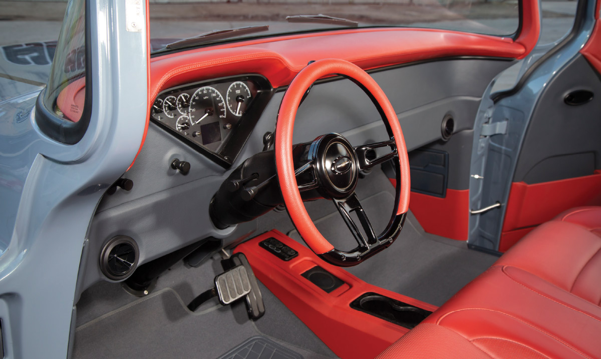 Steering wheel wrapped with red leather