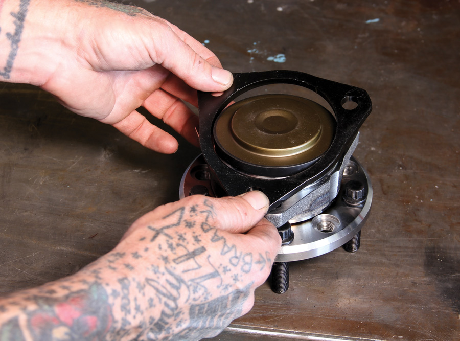 “standard Mustang II offset” spacer is set onto the backside of the mounting flange