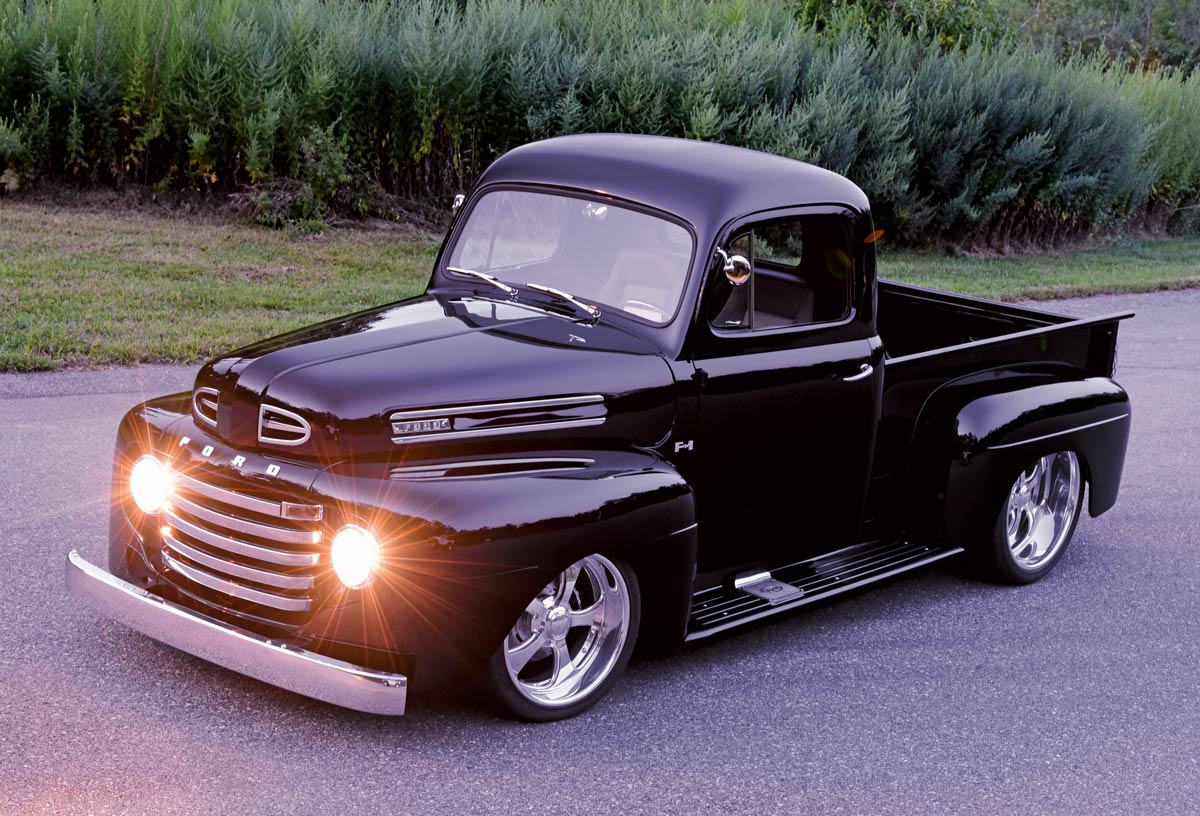 black truck with headlights on