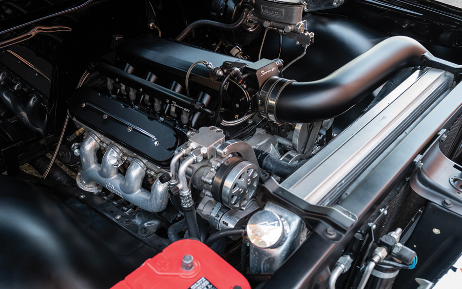 1971 Chevy engine pipes and nozzles close up