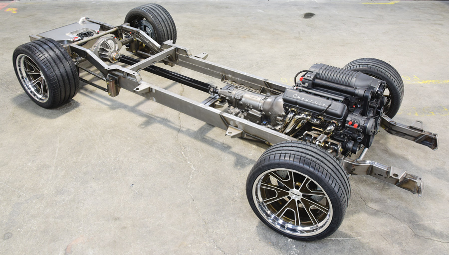 1965 Chevy C10 body frame displayed on floor