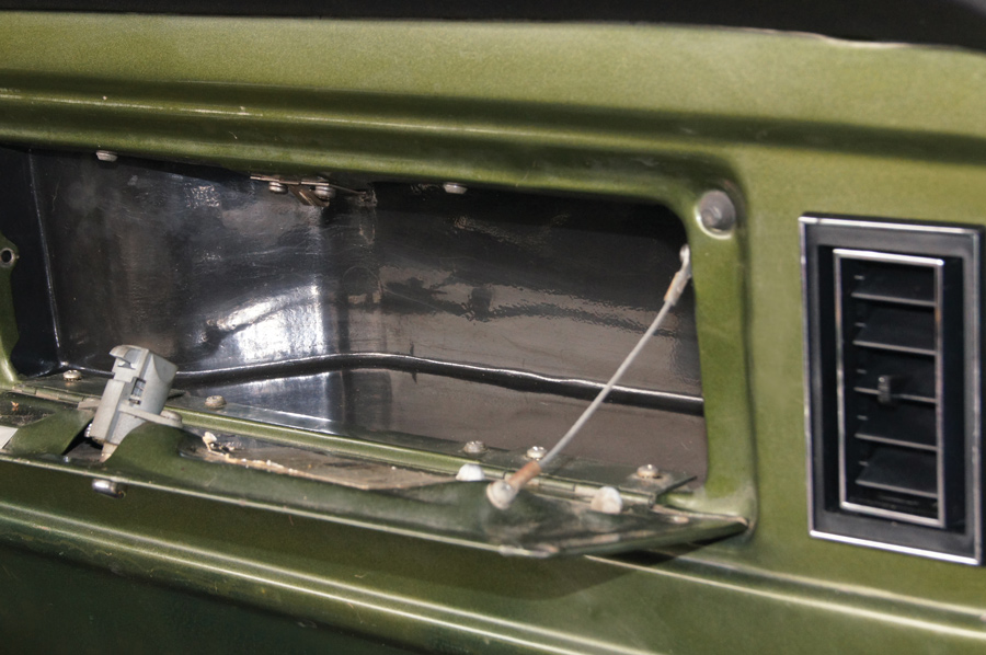 Now that the installation was done, the Vintage Air glovebox was slipped in place and screwed down
