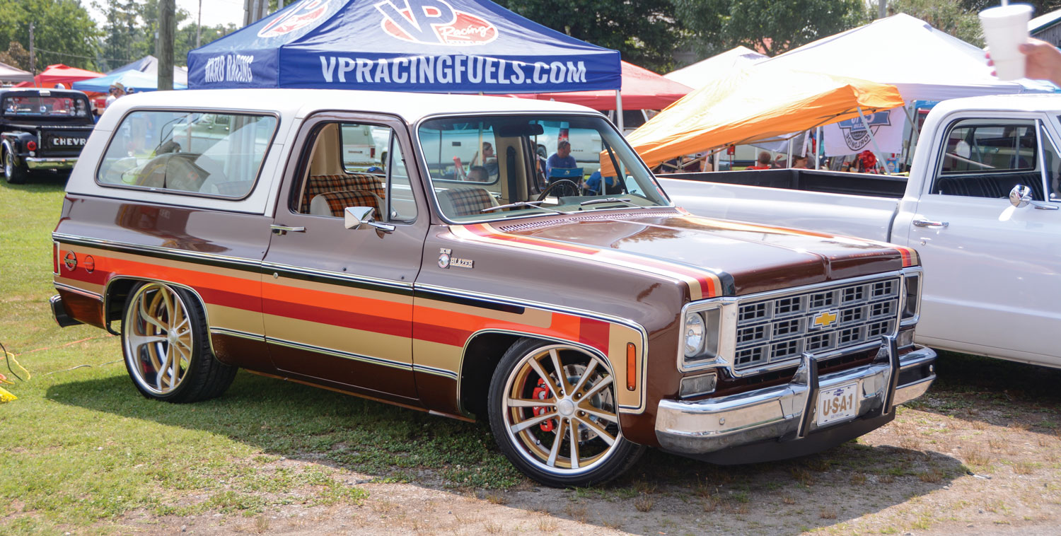 Brown, orange, red and tan Chevy truck