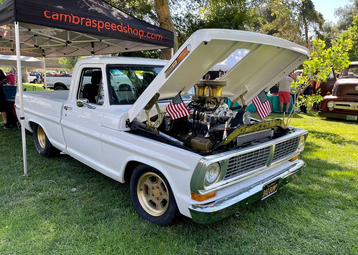 White F-100 with its hood up
