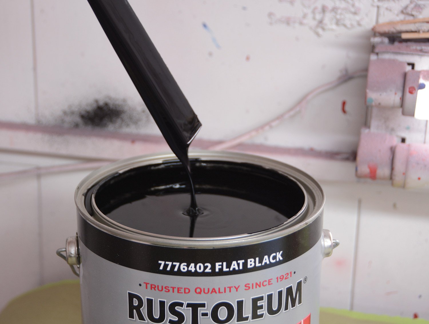 the Rust-Oleum oil-based enamel paint is mixed and prepared for use