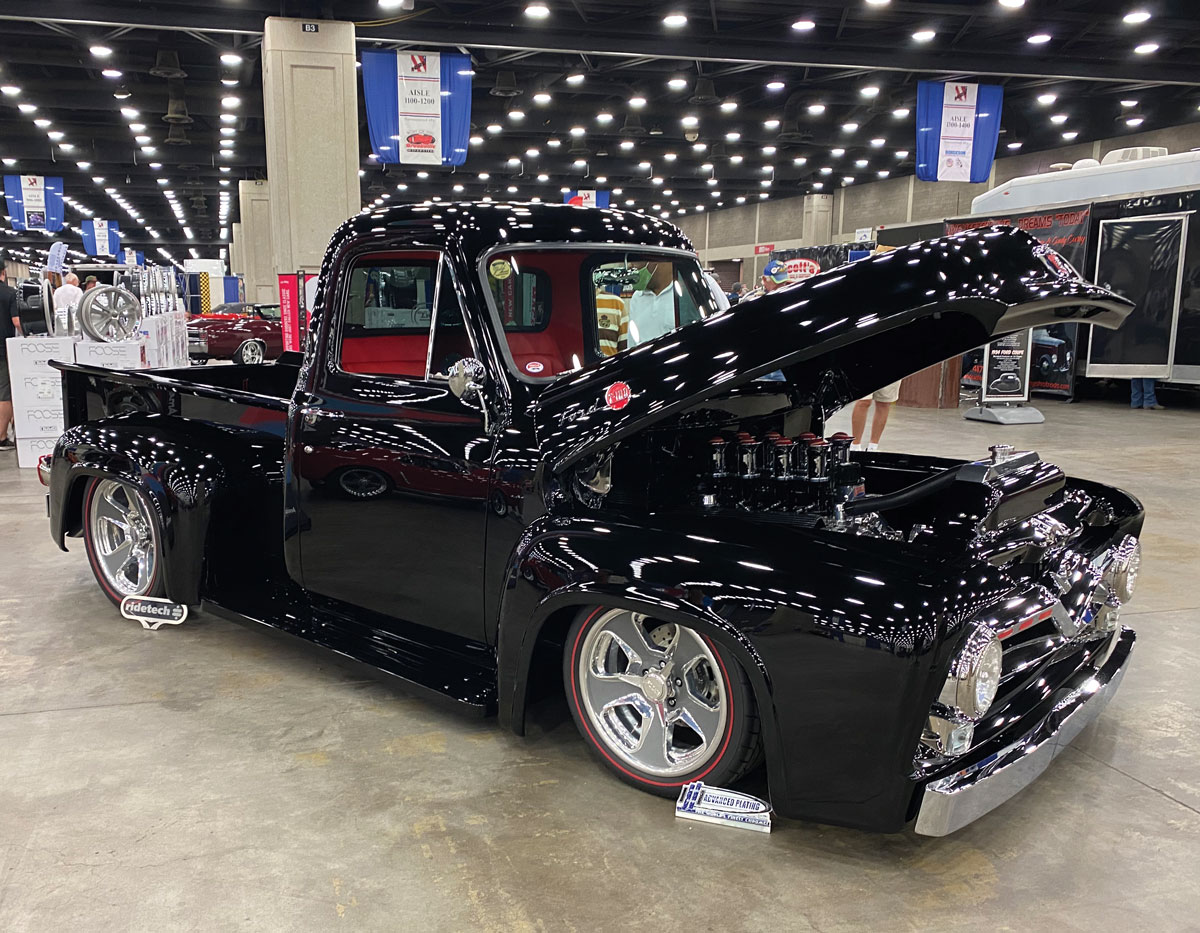 Black truck with an open hood