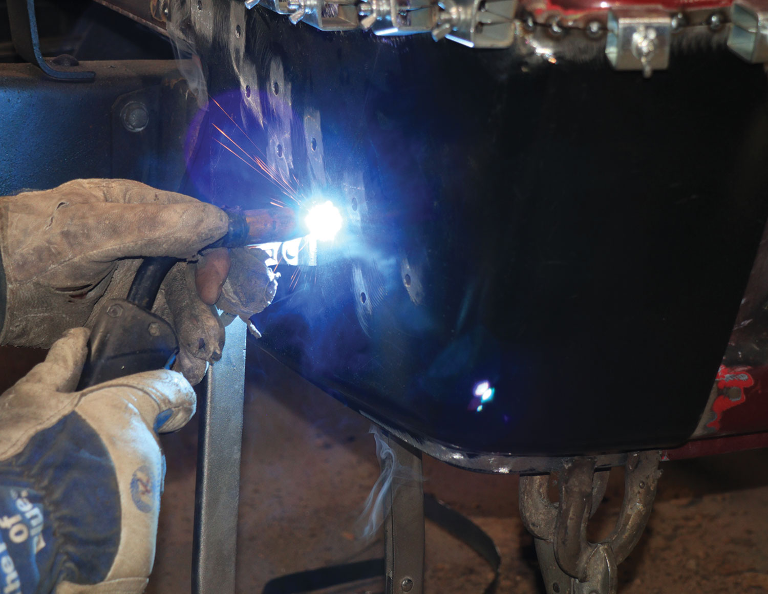 mechanic welds, keeping the heat zone to a minimum to prevent warping