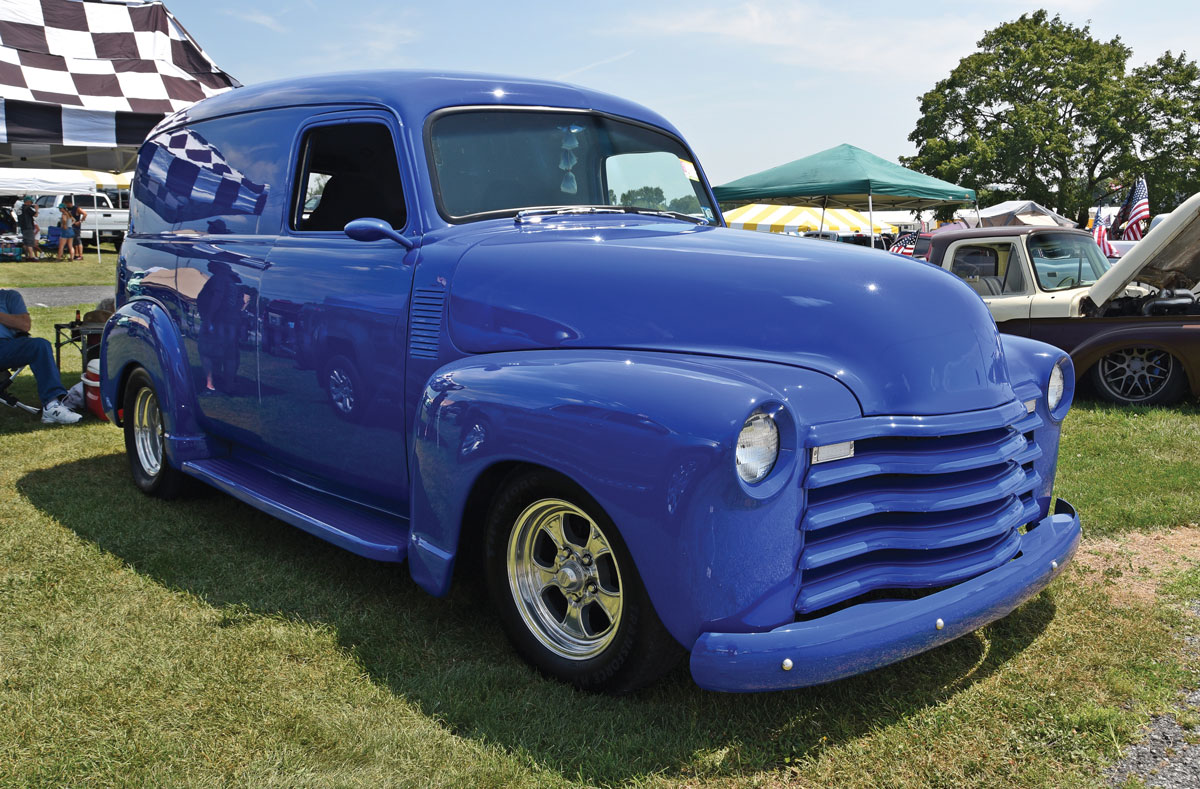 Dark blue truck with covered bed