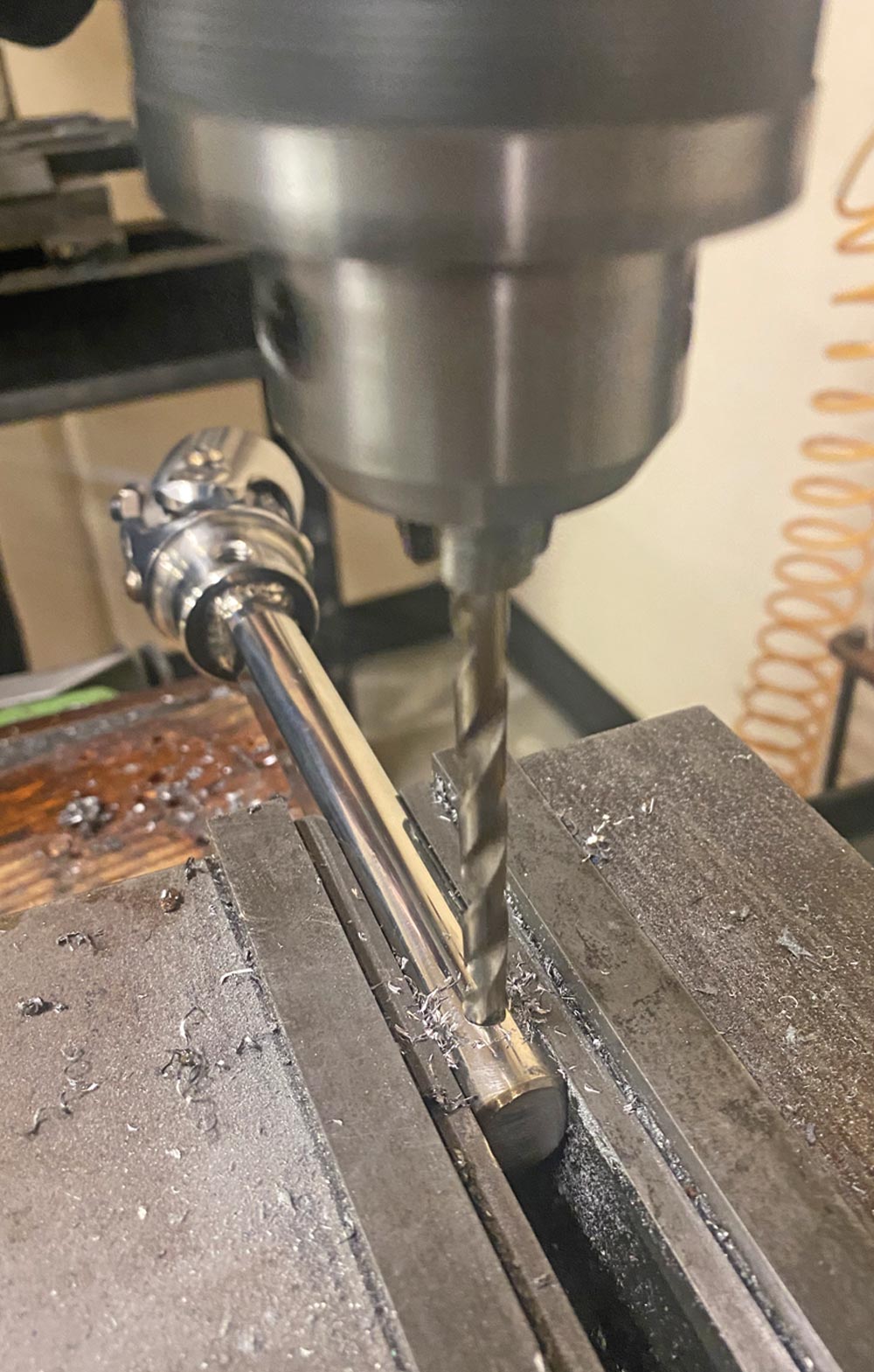 mechanic drills “divots” for your U-joint’s locking set screws