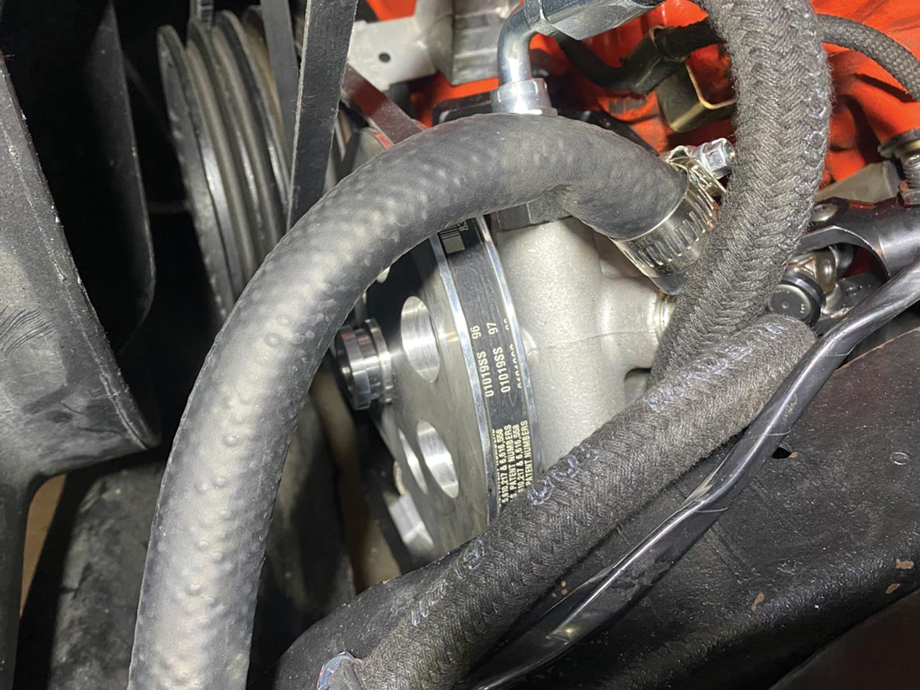 view of multiple power steering hose lines