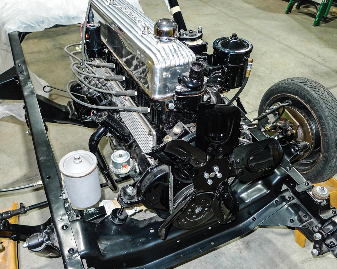 wide view of the recovery can unpainted and connected to the frame