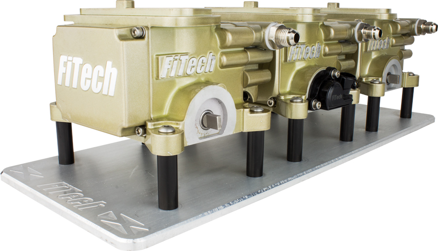 Combining nostalgia and technology, the FiTech Go EFI uses three 500-cfm throttle bodies. This system will support up to 600 hp and is designed to be a simple, ready-to-run installation. Kits for LS engines are now available. 