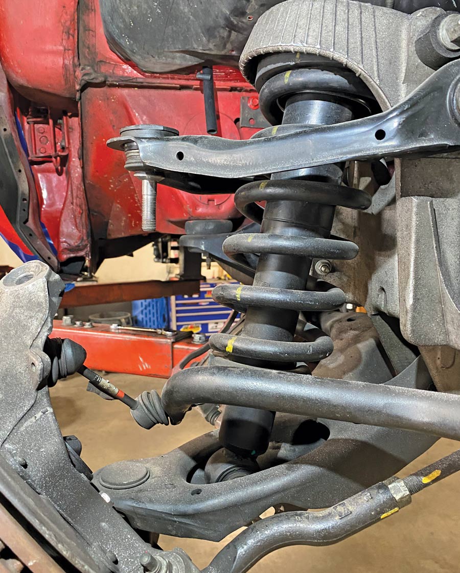 an adjustable post stand to take some pressure off the suspension while the upper ball joint, lower shock mount, and sway bar endlinks are undone