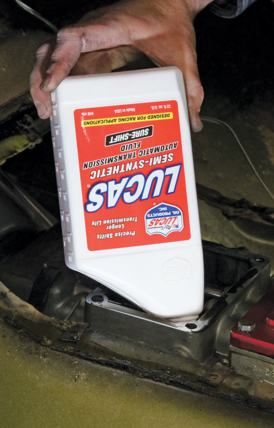 With everything bolted up we filled the trans with Lucas Sure Shift fluid. These late-model transmissions use ATF-type fluid and TREMEC recommends GM Synchromesh fluid, and this Lucas Fluid meets those specs. 
