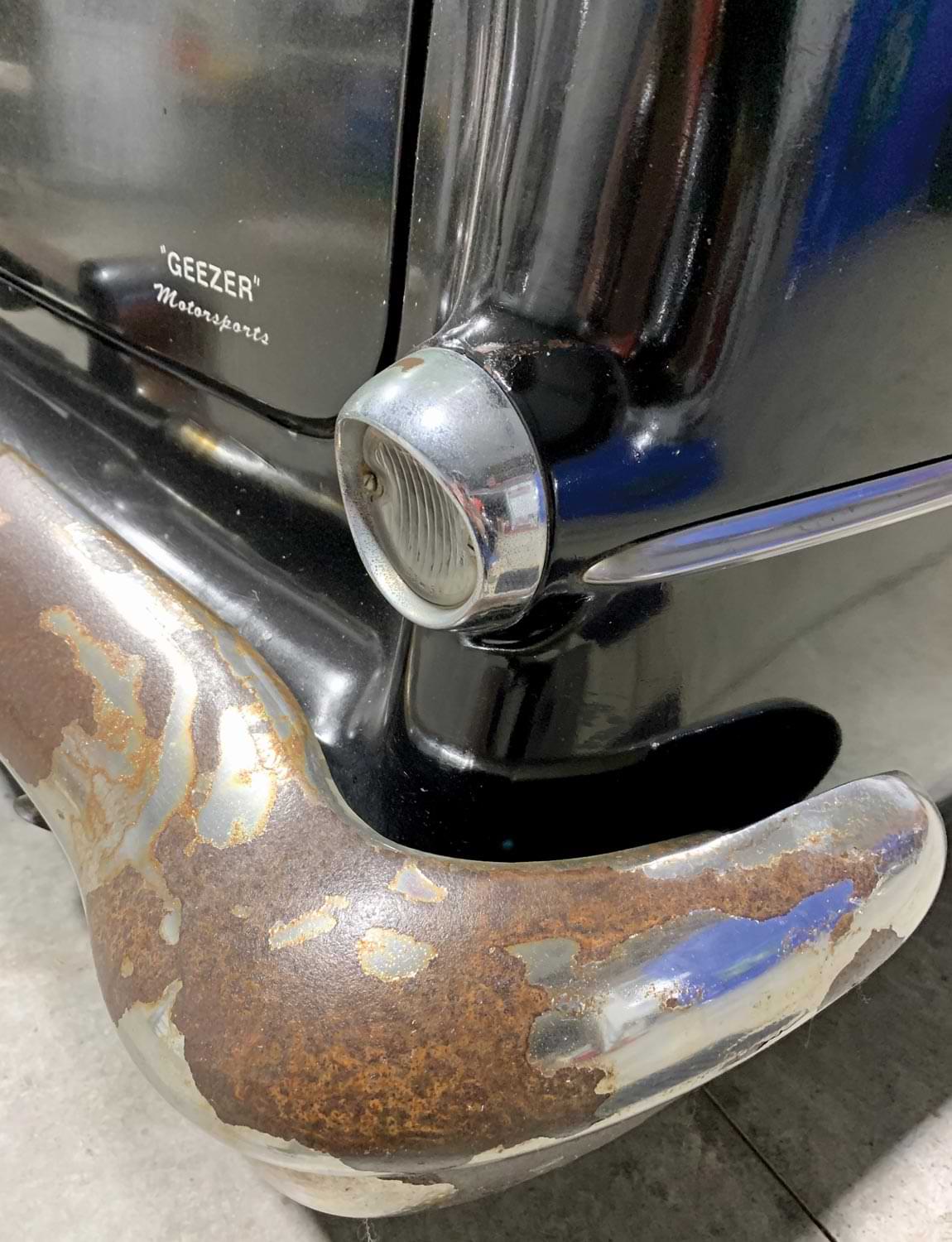 close view of the reverse lamps on a ’55 Olds