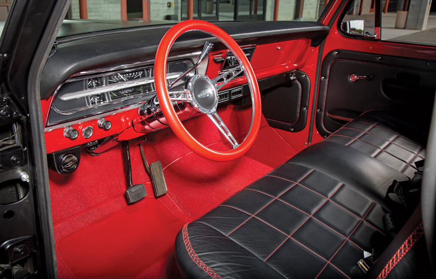 red and black truck interior in a '69 Ford F-250