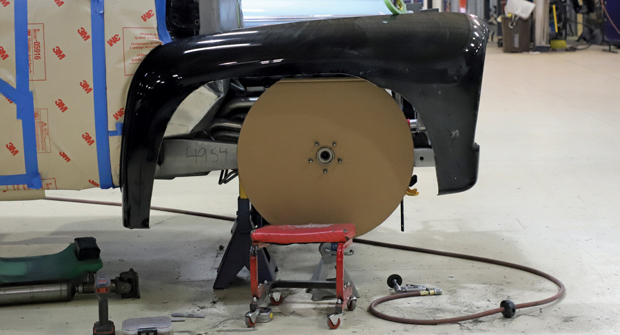 To accommodate the lengthened wheelbase, the front fenders were modified by cutting out the factory wheel openings. 
