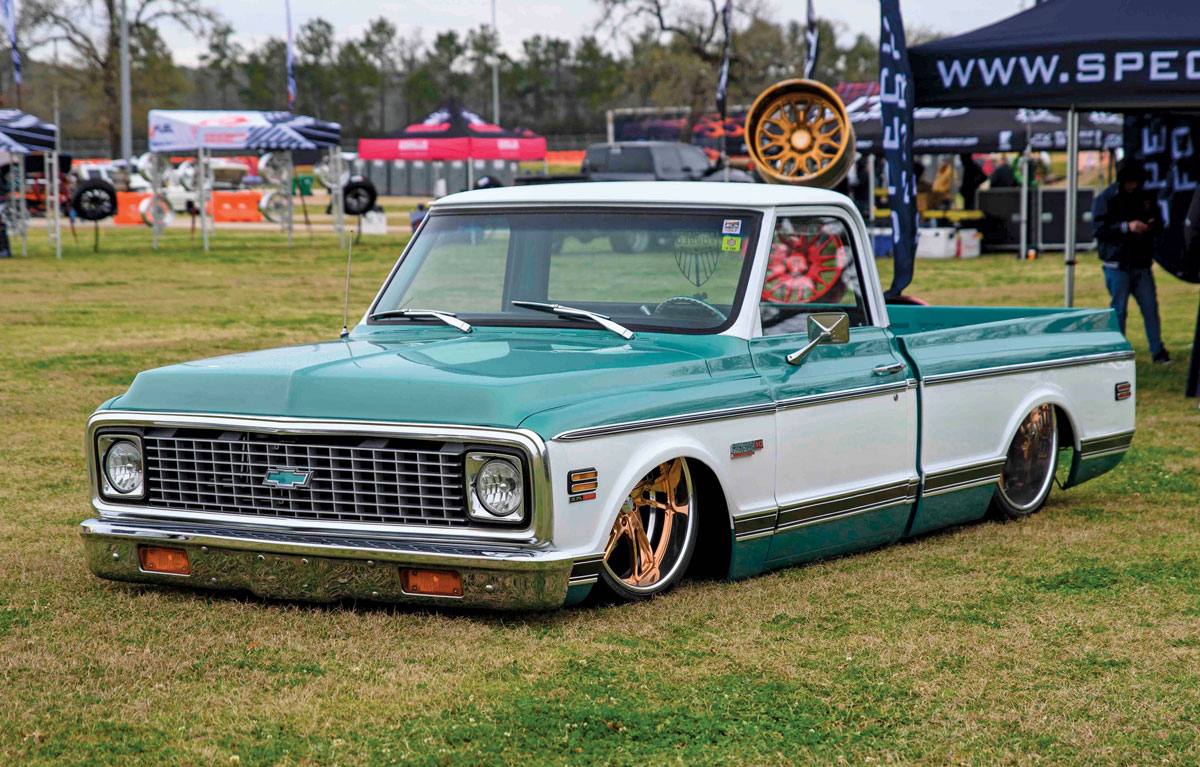 Teal and white lowered Chevy truck