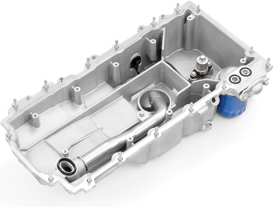 A redesigned windage tray is utilized in addition to a new oil scraper designed to enhance performance and efficiency by improving oil flow control and bay-to-bay crankcase breathing