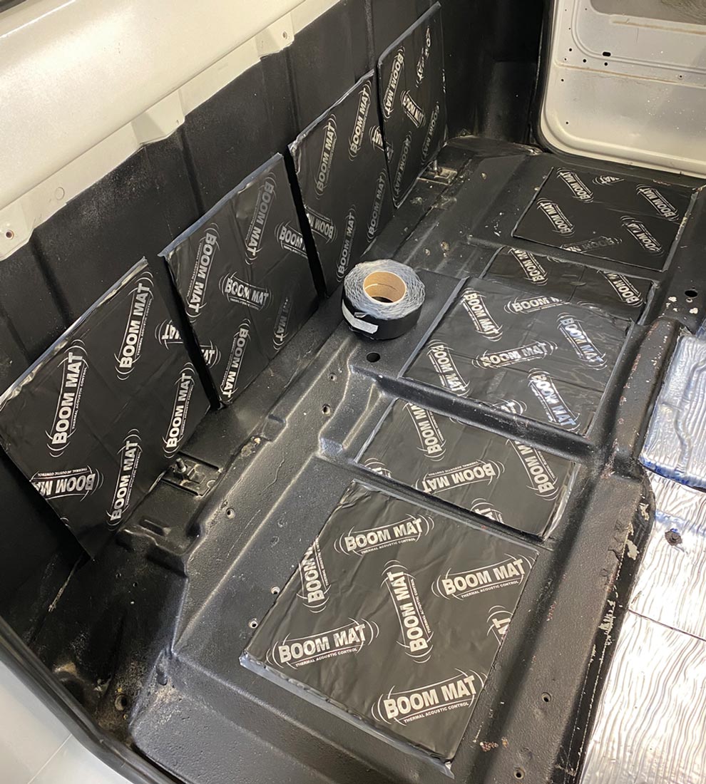 the pre-cut Boom Mat material is mocked in place on the cab floor