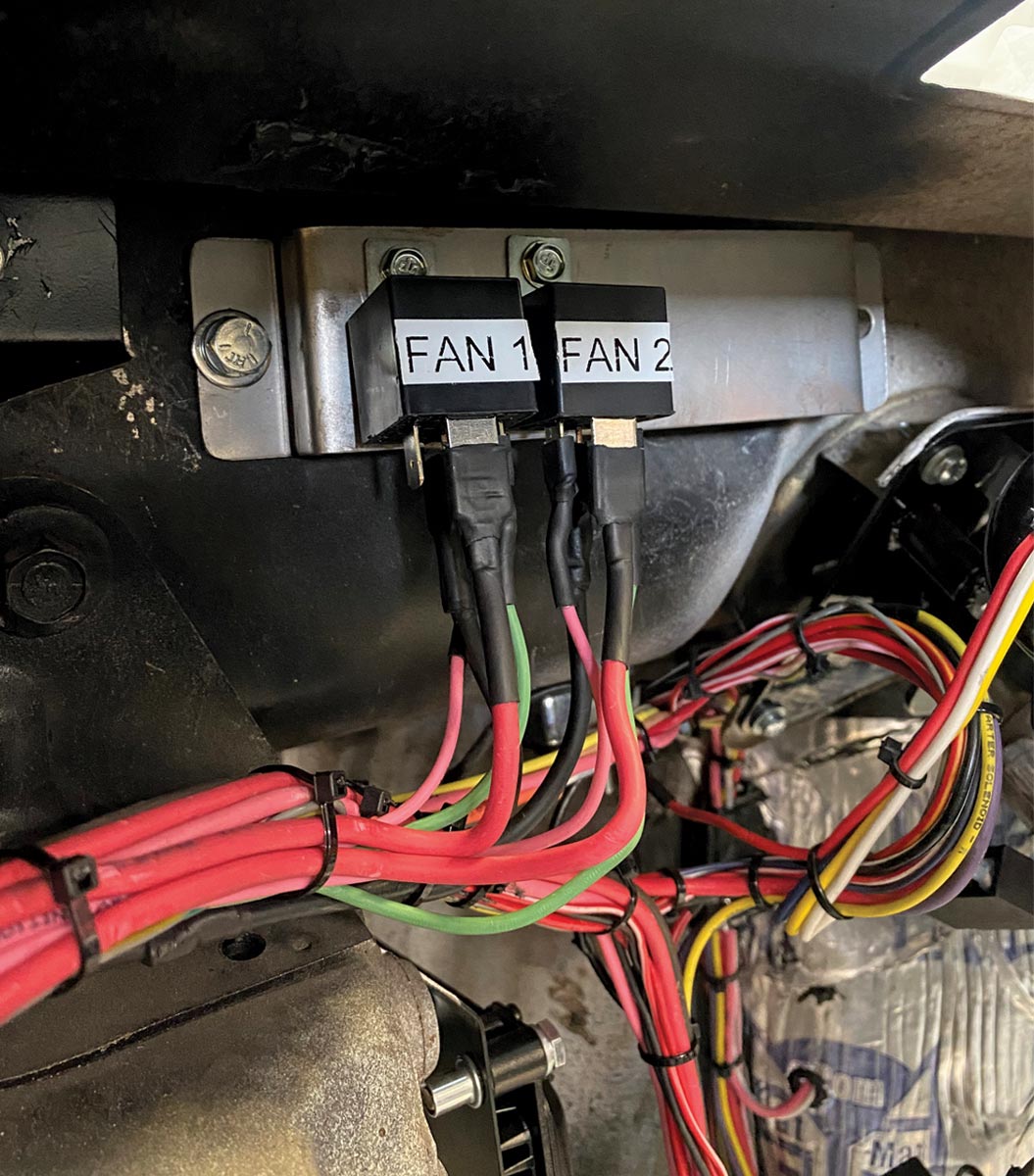 the fan relays bracket under the dash next to the main panel
