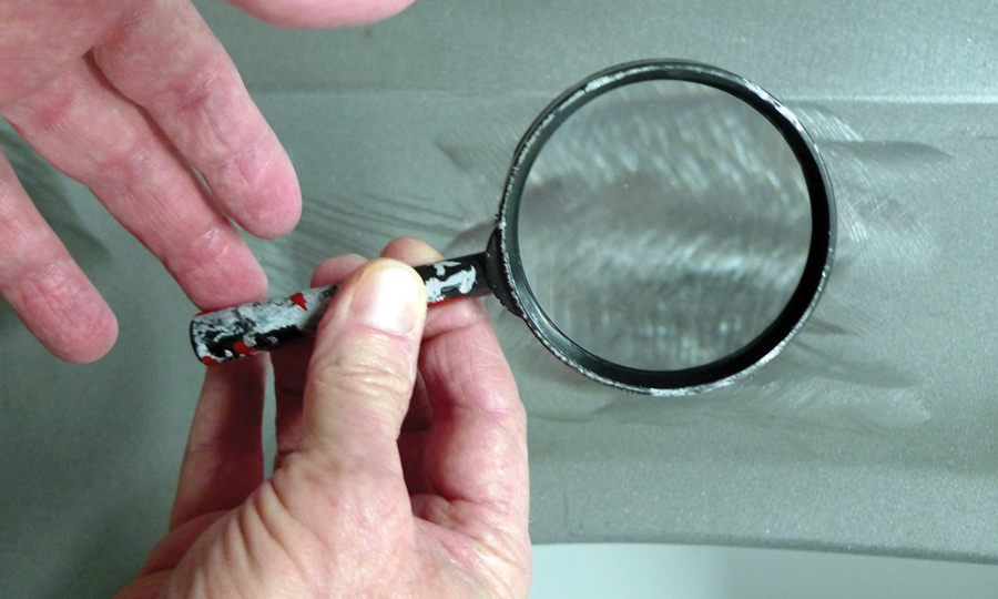 Magnifying glass checking out where a hole used to be
