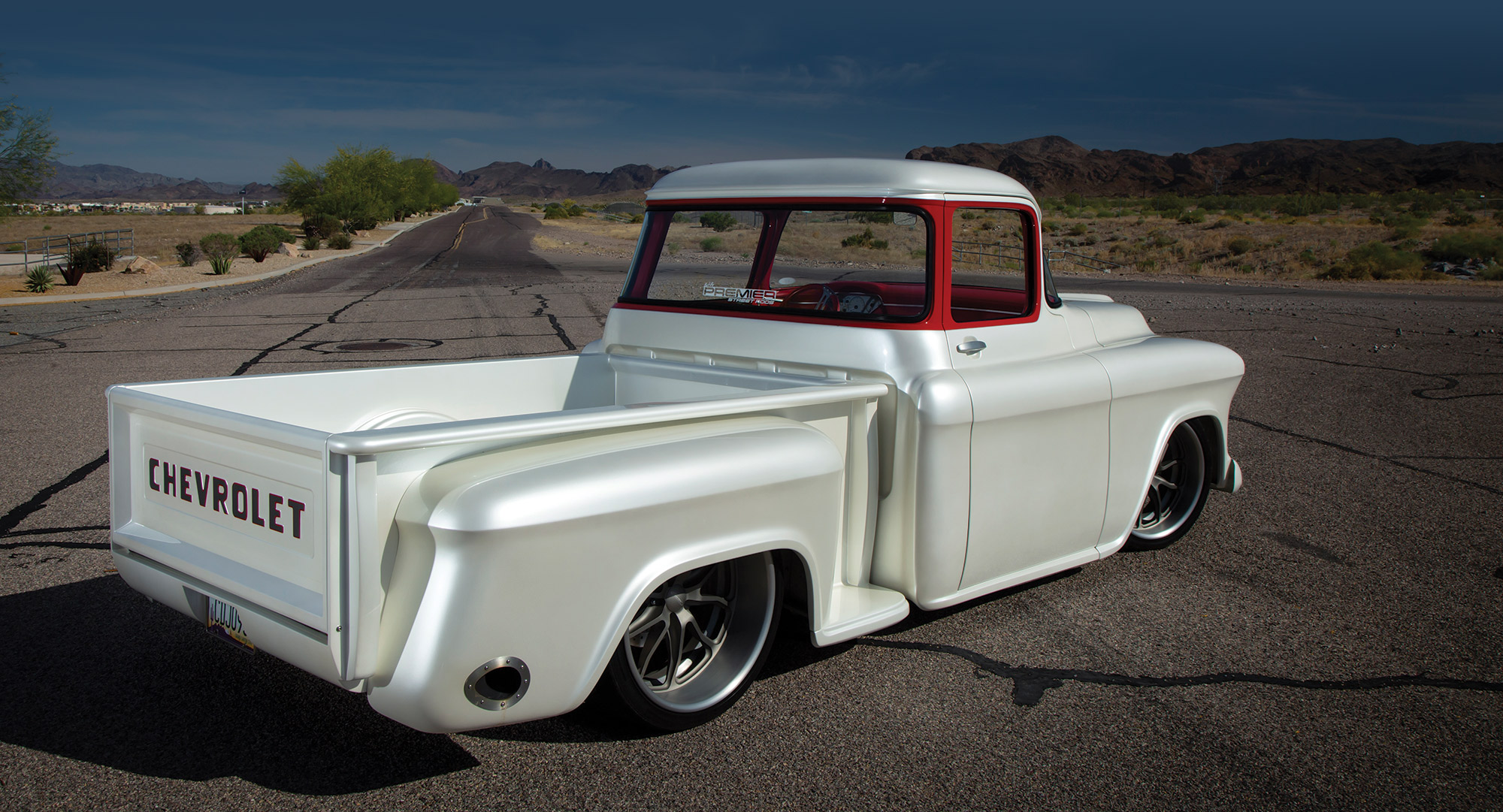 side profile of white '57 Chevy