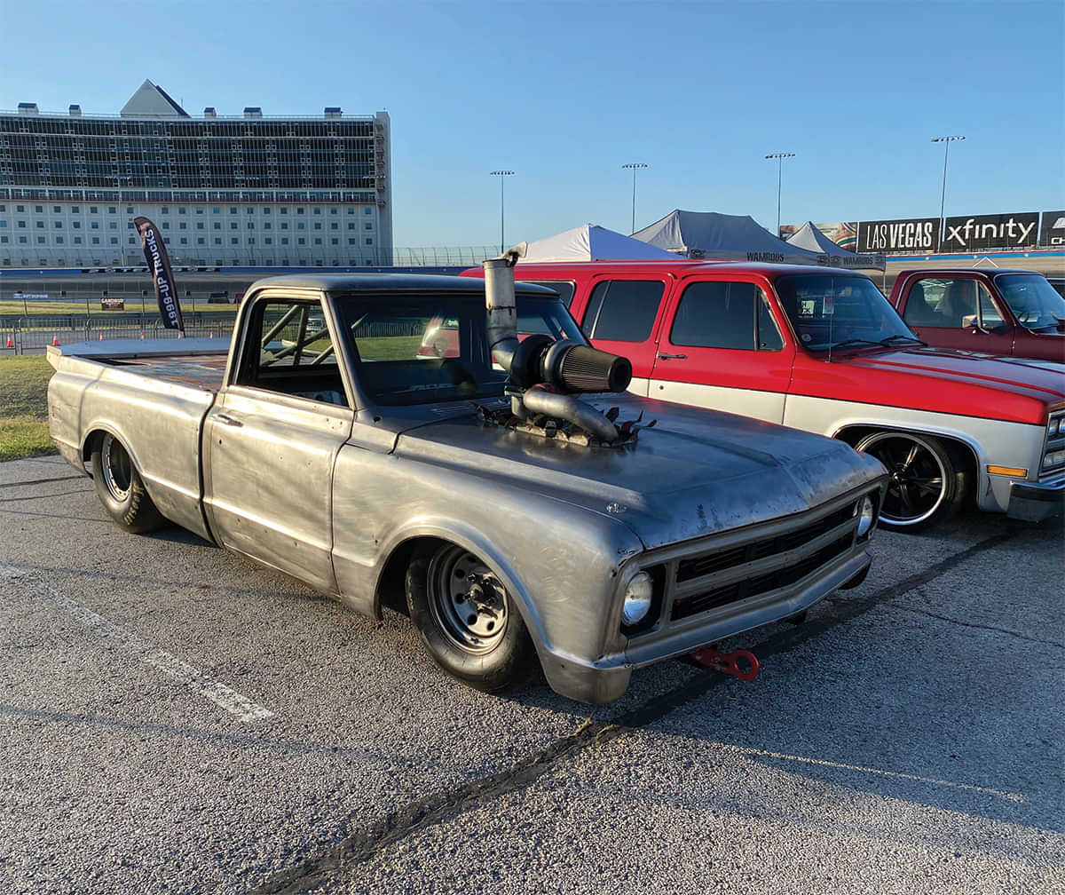 flat gray c10 dragster with exposed turbo