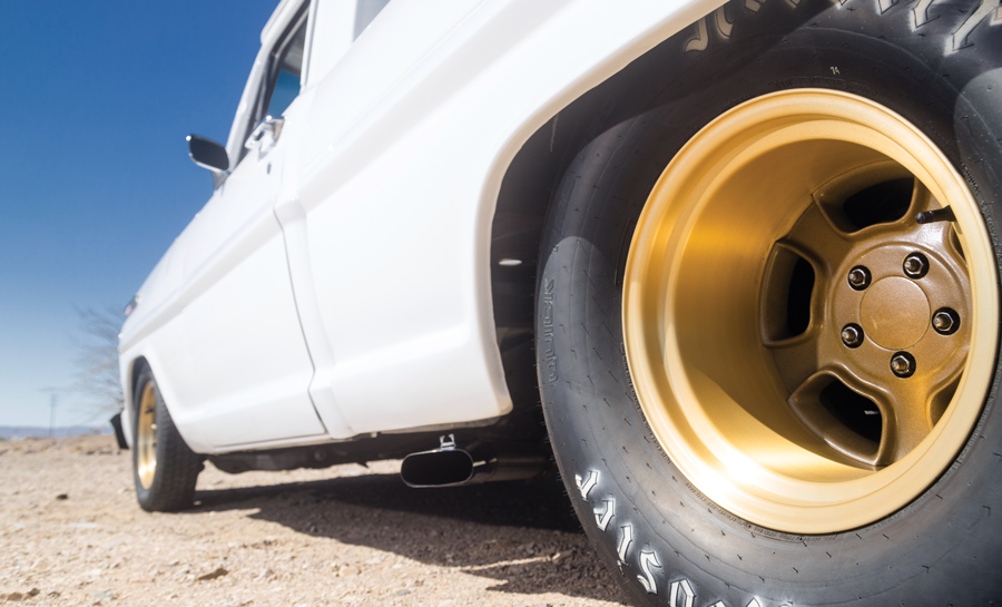 close up of tire and rim on a white truck