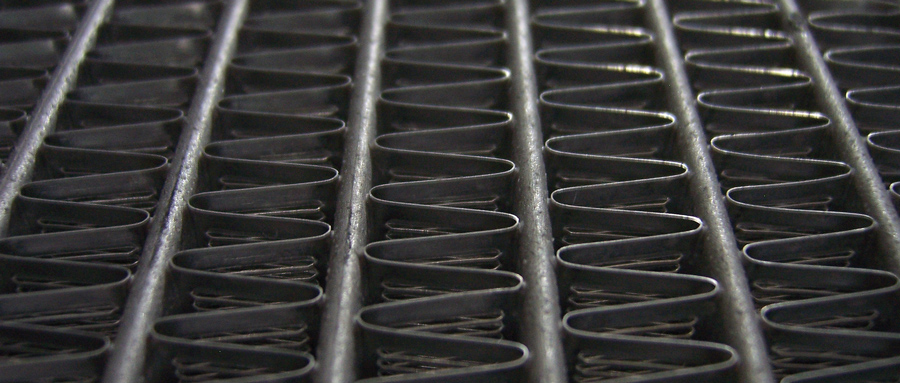 The fins between the tubes in Afco radiators have tiny louvers.