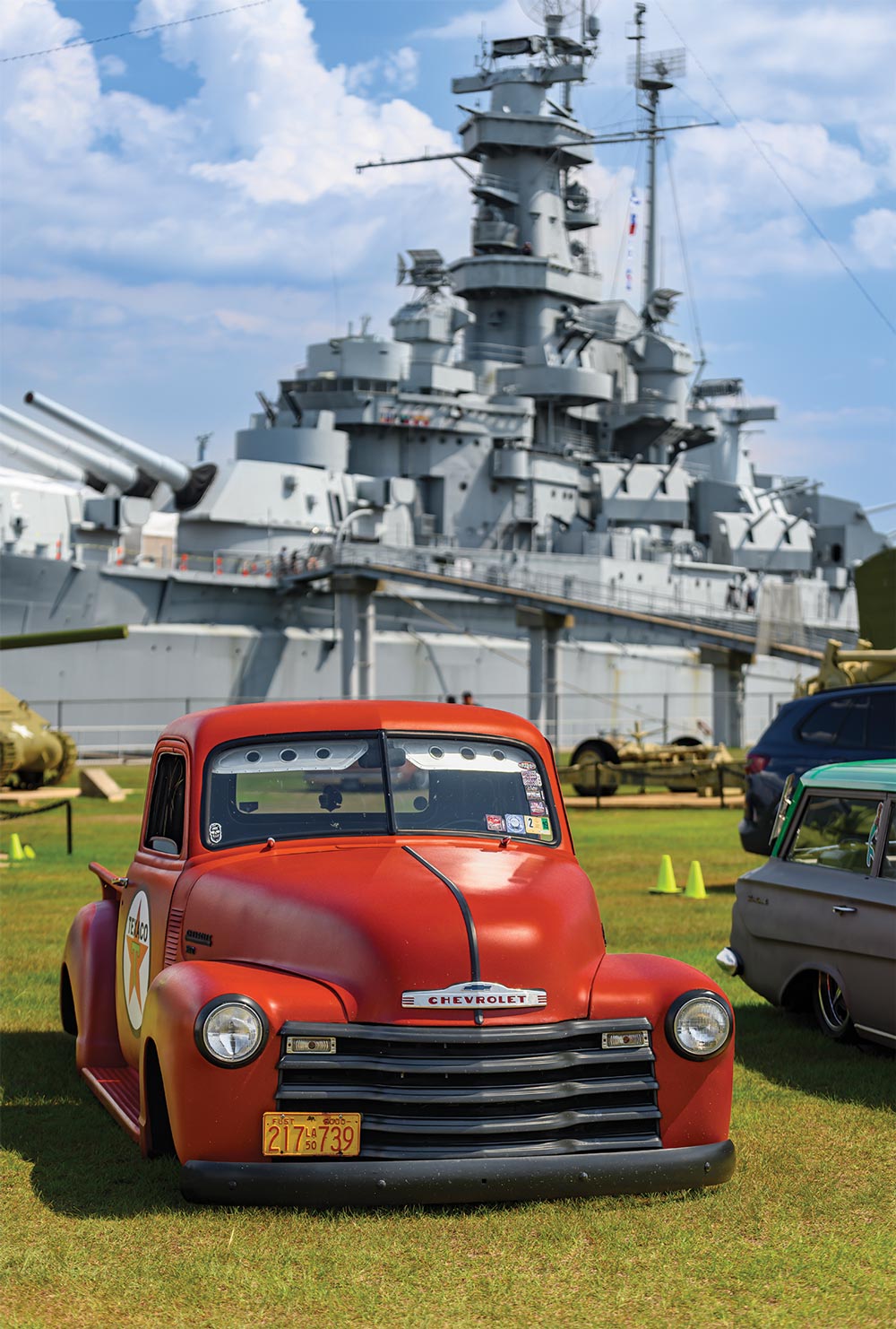 Lowered '55 Chevy with USS Alabama in background