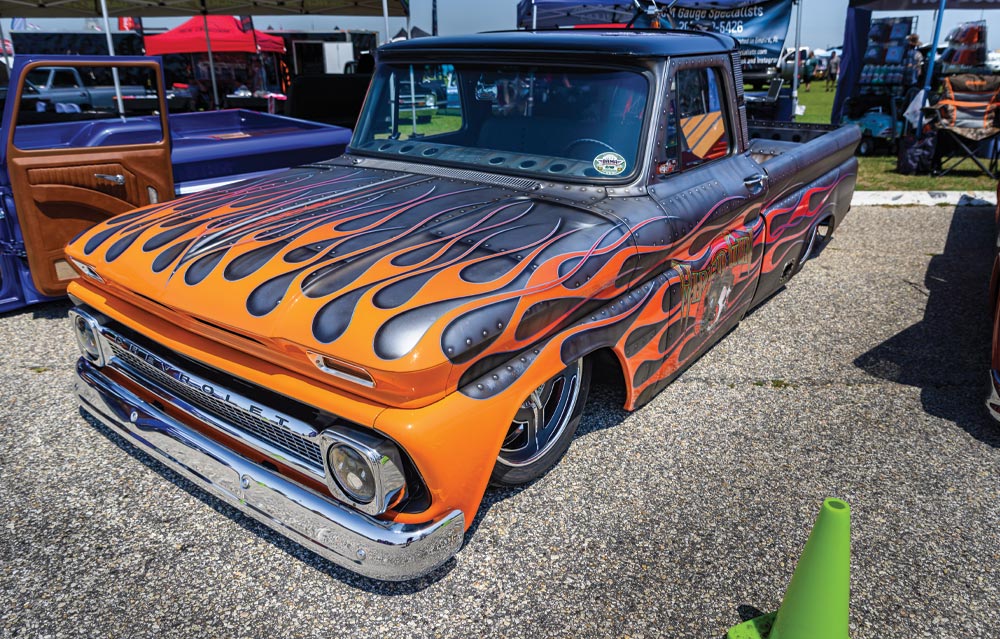 Slammed 1st gen C10 with WW2 fighter jet panel livery and flames