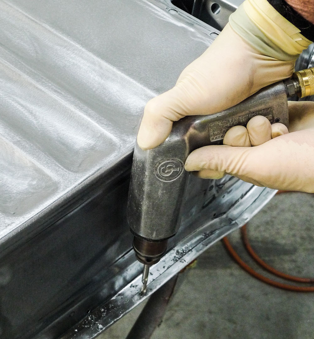 Reaming doorskin's crimped edge with small spot-weld reamer